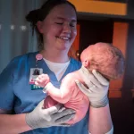 Whitney Steinolfson: RN at JRMC Family BirthPlace providing newborn care.