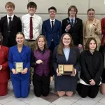 Speech Team: L-R Top row. Head Coach Shawn Thurston, Kylie VanBruggen, Cooper Anderson, Grady Samuelson, Joey Sayler, Carter Hass, Cadence Fetsch, Quin Kruger, Assistant Coach Nyssa Haslerud, L-R bottom row. Kaydence Blunck, Leah Hochhalter, Ada Gilbertson, Addison Fetsch, Abby Wilmes, Kaylena Santos, Alyssa Wilmes, Alizabeth Nelson.