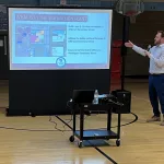 Referendum: ICON Architect giving a presentation.