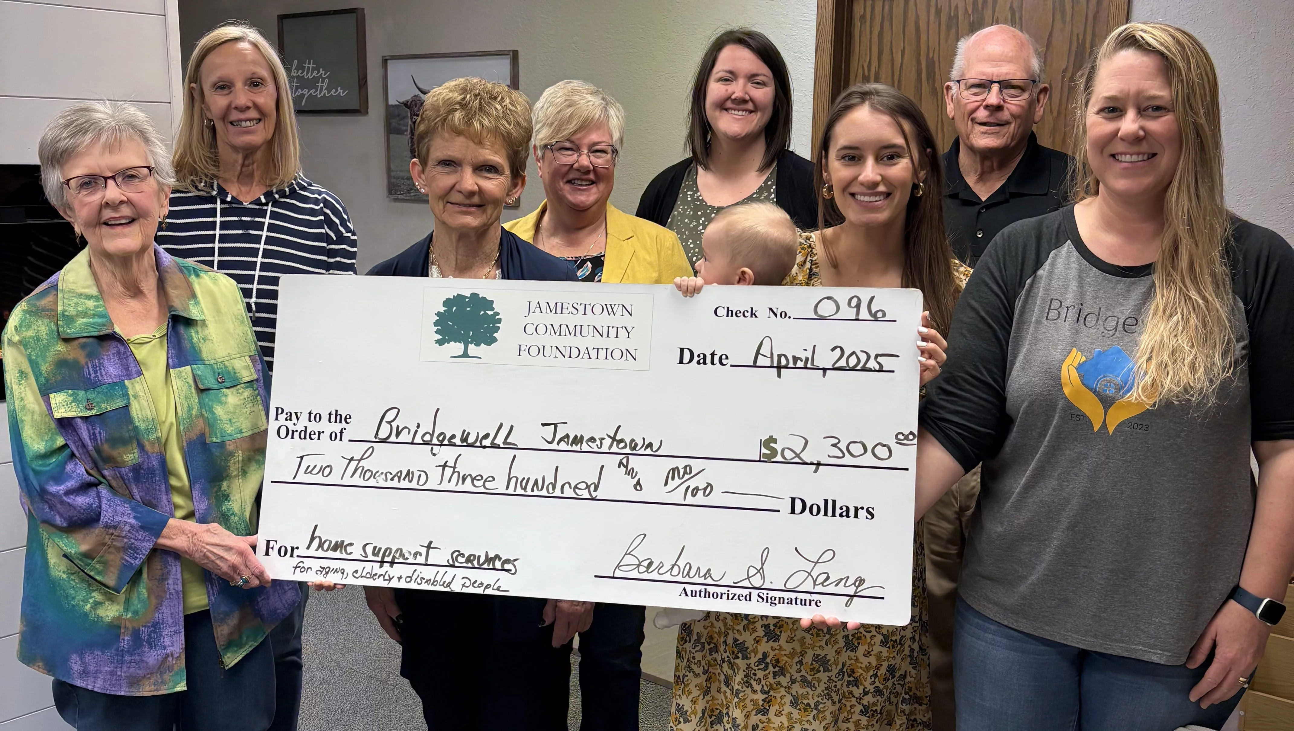 Pictured, front row, l-r: Barb Lang and Shirley Jackson, Jamestown Community Foundation board members; Hannah Fettig (holding the helpful William Fettig) and Cherith Smith, Executive Director, both with Bridgewell. Back row, l-r: Paulette Ritter, Mary Lou Urquhart, Emily Bivens and Casey Stoudt, all Jamestown Community Foundation board members.