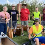 river-clean-up-2: Scott Tichy and family, including two exchange students were ready to clean up the river.