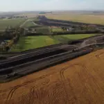 diversion: A U.S. Army Corps of Engineers contractor works to construct a ring levee near Oxbow, Hickson and Bakke, North Dakota.