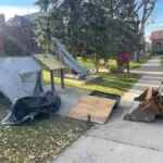 Lewis Legge: Setting up display stands on VCSU campus.