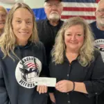 Sanborn Vets Park Donation: Back Row: L to R; Wayne Becker, Don Schlotman, Joe Pesek. Front Row: L to R; Nicolette Blumler and Tammy Jacobson.