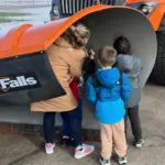 Students sign the plow