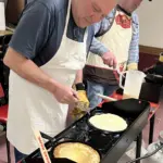Board member Todd Ingstad: Flipping Swedish pancakes.