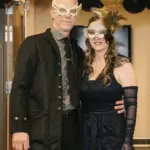JRMC: Golden Gala attendees dressed to the masquerade theme, complete with masks and formal wear.