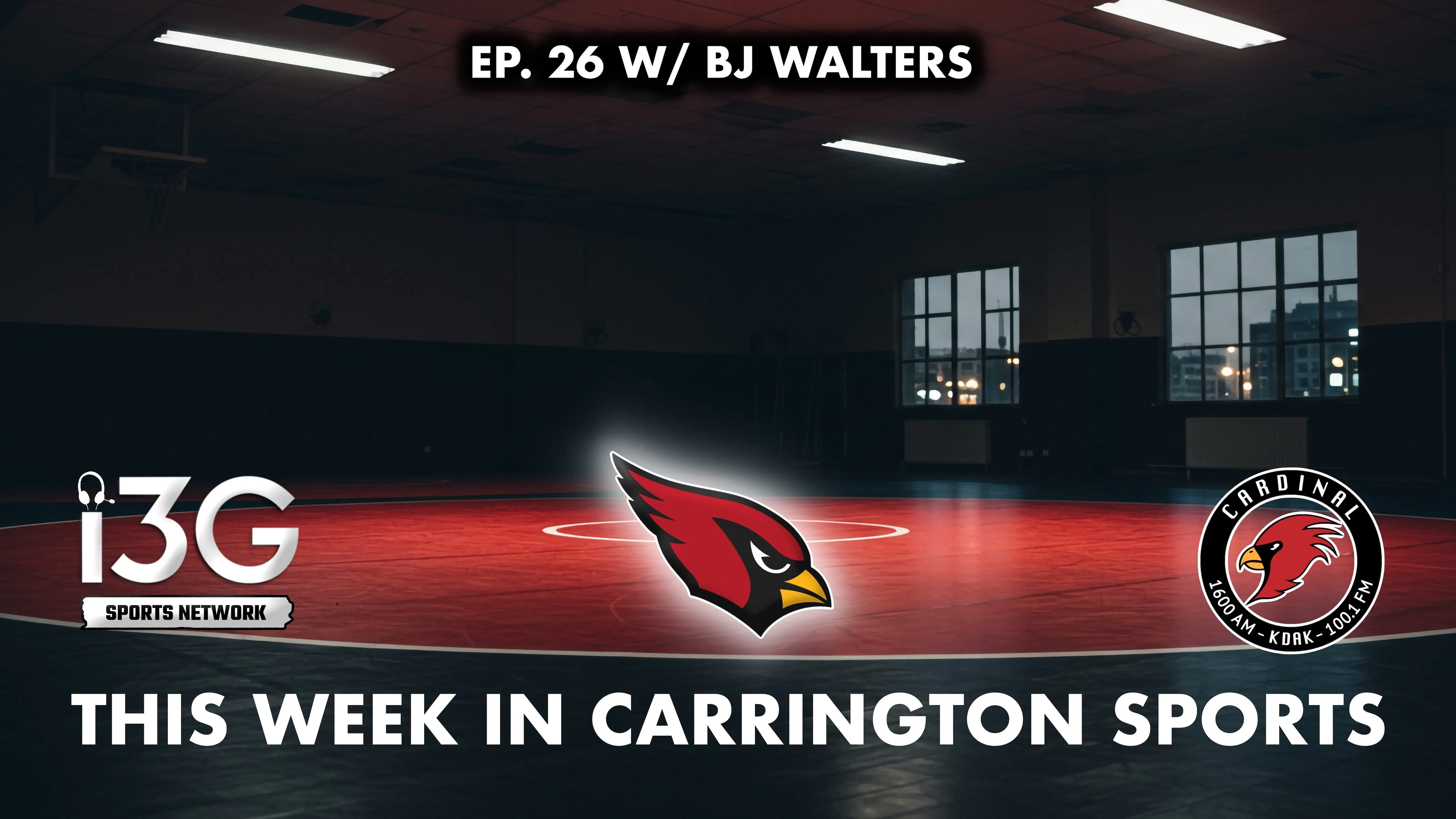 an-empty-wrestling-room-with-a-red-mat-and-windows-showing-a-city-at-night-under-fluorescent-lights-2