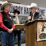 Dick Nelson honored: Board president Jerry Stokka honors Dick Nelson for his service on the board for 19 years as Executive Director Rick Thompson gets ready to present Dick Nelson with a gift.