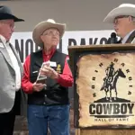Dick Nelson Honored: L to R; Board Treasurer Marv Semrau, Dick Nelson, and Board President Jerry Stokka.