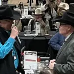 Dale Pahlke Honored: L to R; Pahlke is pleasantly surprised to receive the Legacy Award from Executive Director Rick Thompson.