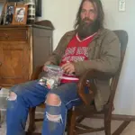 AI created image: Jerry had AI create an image of a homeless man and put him inside his house The homeless guy in a house has been used to scare people. Create the image and send it to someone and tell them a bad guy is in your house you have to get out and call the cops. Which has happened, to the point where law enforcement came out and said people should stop doing this.