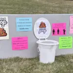 Scoop on poop: Trinity Lutheran Church shared information through their display called “Scoop on Poop” on how ‘poop’ has a relationship to hunger and health.