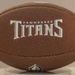 Tennessee Titans football on white stand.