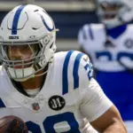 Indianapolis Colts running back Jonathan Taylor #28 warms up prior to an NFL football game against the Los Angeles Chargers at SoFi Stadium^ Oct. 19^ 2025^ in Inglewood^ Calif.