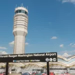 Control Tower^ National Airport seen from Metro Station platform. Ronald Reagan National Airport^ aka DCA^ is actually in Arlington^ three miles from DC. ARLINGTON^ VIRGINIA - OCT. 12^ 2017