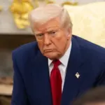 United States President Donald Trump speaks to the press in the oval office in the White House in Washington DC.' WASHINGTON D.C.^ USA - April 7^ 2025