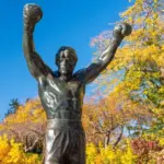 PHILADELPHIA^ PENNSYLVANIA - NOVEMBR 16^ 2016: The Rocky Balboa statue during autumn. The statue commemorates the The Rocky film series which has become a cultural icon.