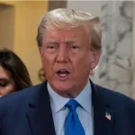 Former President Donald Trump speaks to press before the start of civil fraud trial brought by NYS Attorney General Letitia James at NYS court in New York on October 2^ 2023