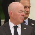 U.S. Homeland Security Secretary Alejandro Mayorkas attends a Memorial Day ceremony at Arlington National Cemetery. ARLINGTON^ VA^ USA - May 29^ 2023