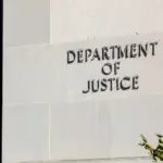 Sign of United States Department of Justice(DOJ) on their headquarters building in Washington^ D.C. USA. Washington D.C.^ USA - March 1^ 2020