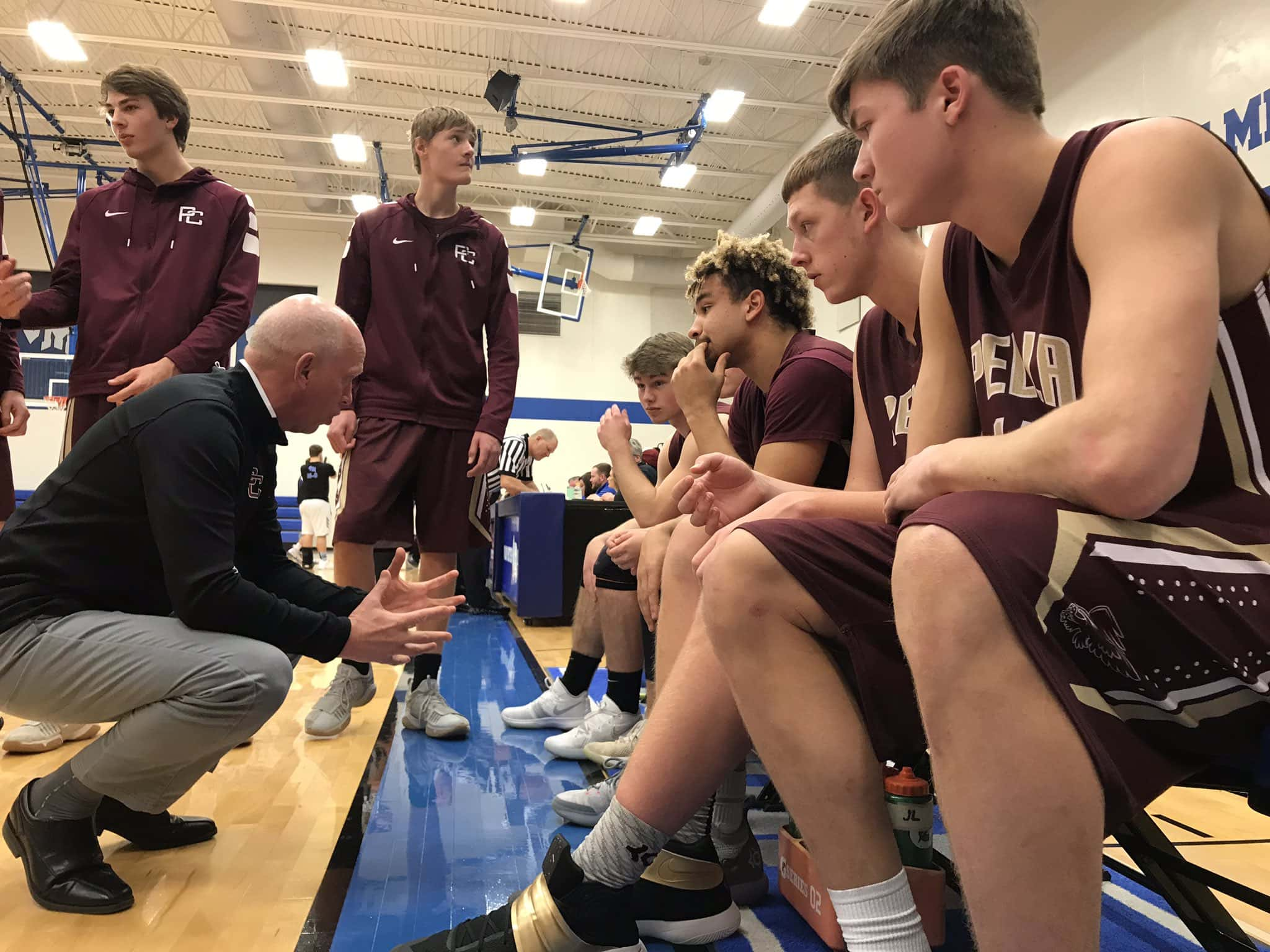 pella-christian-basketball-huddle