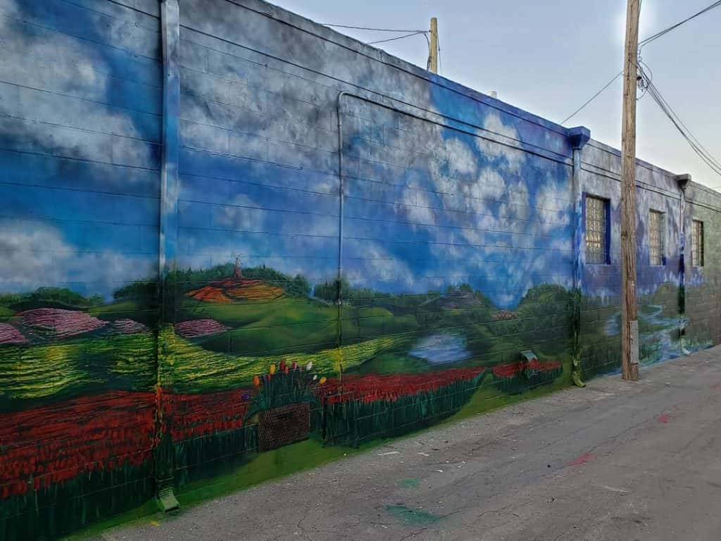 Downtown Mural Completed by Pella Native KNIA KRLS Radio The One to