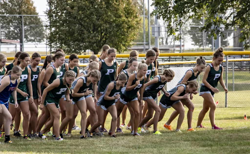 Pella Cross Country Teams Earn Sweep at Ballard - Vimarsana News