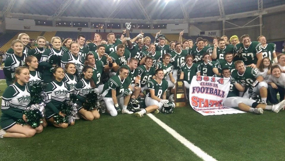 2014-pella-football-team-champions