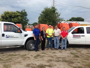 (L to R) Doug Rothfus, Minburn Communications Plant Manager,  Minburn Communications General Manager Debra Lucht,  William Beckwith, White Construction Superintendent,  Perry City Administrator Butch Niebuhr, Perry Public Works Director  Jack Butler