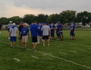 Perry defense gets instructions from Tom Lipovac, Jim Richmond and Jason Olejniczak.