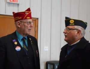 American Legion Vice-Commander Paul Sanford (left) talks with Jim Andrew (right)