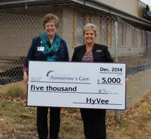 HyVee Food Store Manager Lori Subbert (right) with Foundation Director Hollie Roberts (left)