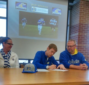 Perry senior Will Whiton signed a National Letter of Intent to South Dakota State Wednesday in front of his parents Kelly and Kurt Whiton and a large gathering of students and family,