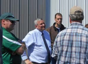 Northey (middle) talks with Mike Holden (right)