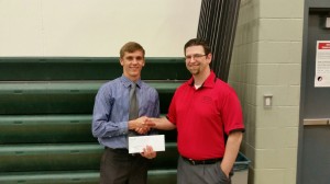 Scholarship winner Alex Bodermann and Raccoon Valley Radio Program Director Chris Cohea