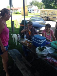 Merchants peddle their wares at the Stuart, Iowa farmer's market. 