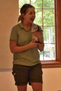 Blank Park Zoo staff member holding a ferret