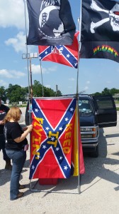 Charles “Dell” Dellavecchia sells several different kinds of flags, including confederate flags, out of his truck in Stuart. 