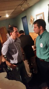 Governor Walker speaking with a voter in Guthrie Center Thursday. 