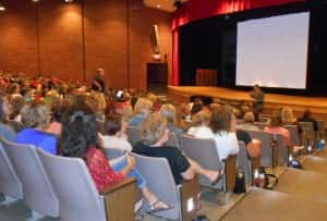 Superintendent Tim Christensen addresses crowd of teachers