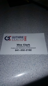 Guthrie Center Compliance Officer Wesley Clark's business card and contact number distributed at Monday's meeting. 