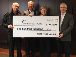 Wild Rose Officials donating check to Foundation Director Hollie Robert