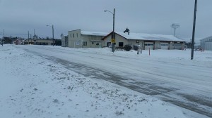 Division Street, a major road in Stuart, is snow-covered Wednesday morning. 