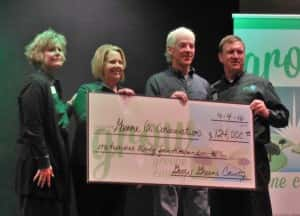 Conservation Director Dan Towers (2nd from right) receives check for project