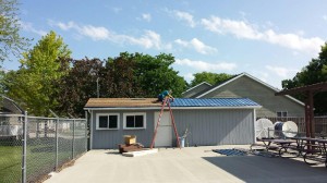 Work being done on the concession stand roof earlier this month. Photo courtesy of JPRD