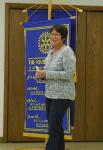 Grand Junction Comm. Center Organizer Diane Wise talks to Jefferson Rotary