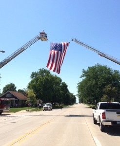 Flag flying over Highway 4 during procession. Photo courtesy of Police Chief Mark Clouse