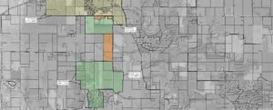 Photo courtesy of City of Adel; yellow = current City limits; green = areas for volunteer annexation; orange = areas not volunteered but still to be annexed