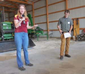 Amy Kaleita (left) and Steven Hall (right) talk about prairie potholes on farmland